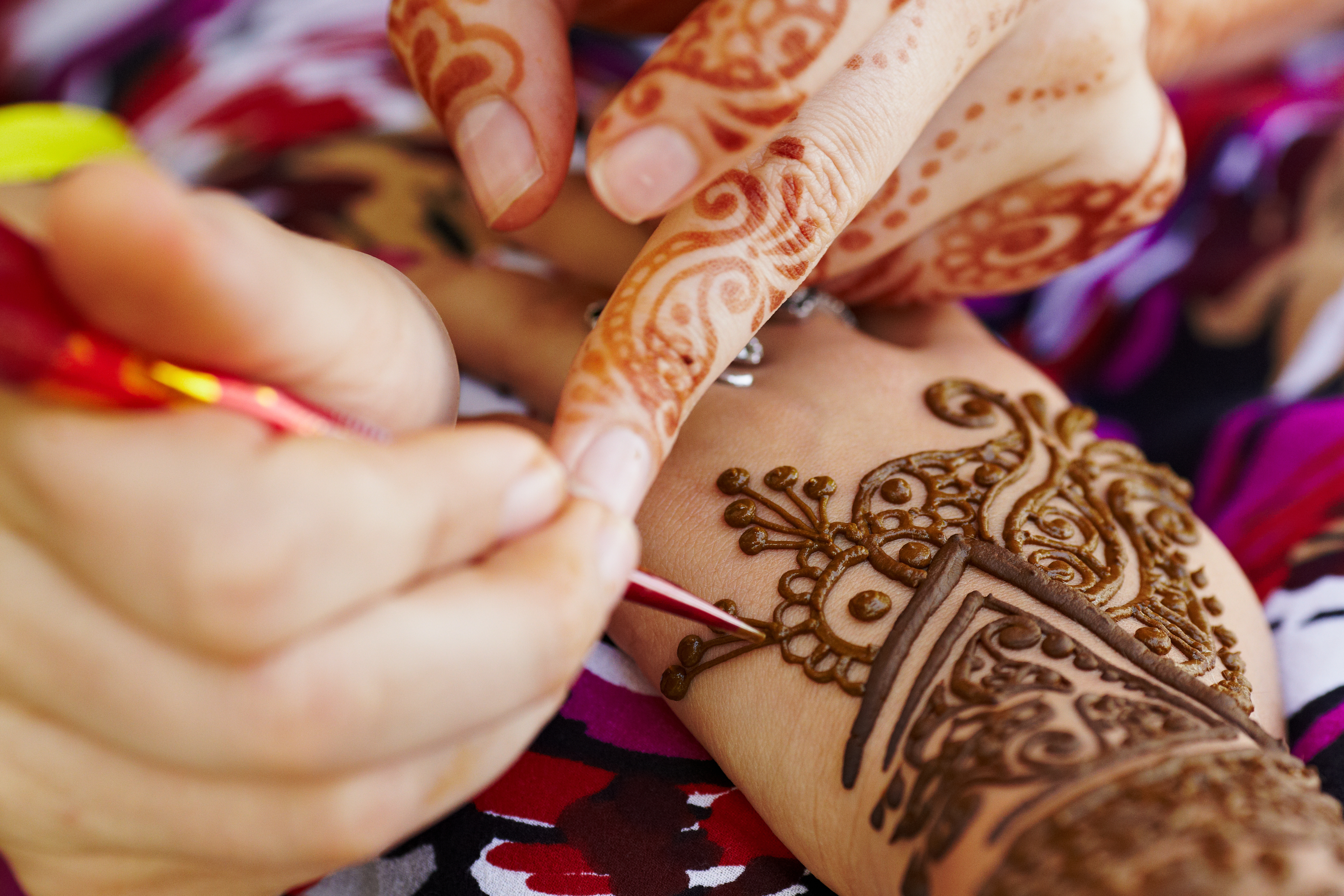 Henna on a person's hands